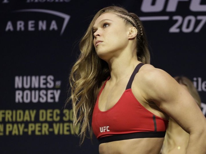 Ronda Jean Rousey (/ËˆraÊŠzi/;[5] born February 1, 1987) is an American professional wrestler, actress, author, mixed martial artist and judoka. She is currently signed to WWE, performing on the Raw brand,[6] where she is the current Raw Women's Champion in her first reign. Her longstanding nickname, 